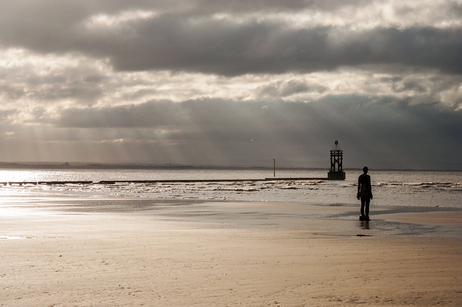 Crosby Beach In Liverpool Relax On A Sandy Beach With An Iconic crosby-beach-in-liverpool-relax-on-a-sandy-beach-with-an-iconic