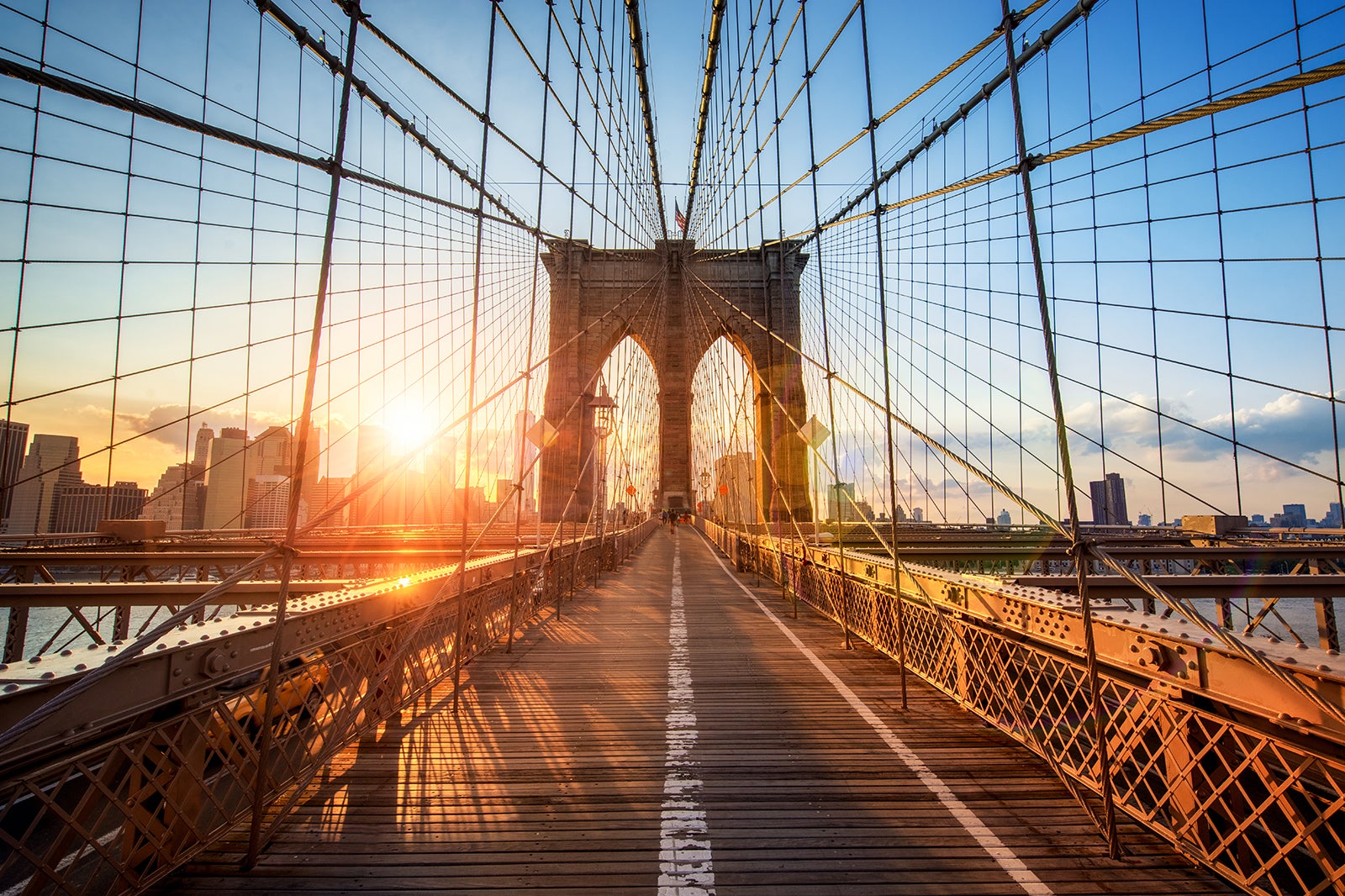 Brooklyn Bridge In New York The Iconic Crossing Between Manhattan And Brooklyn Bridge In New York The Iconic Crossing Between Manhattan And