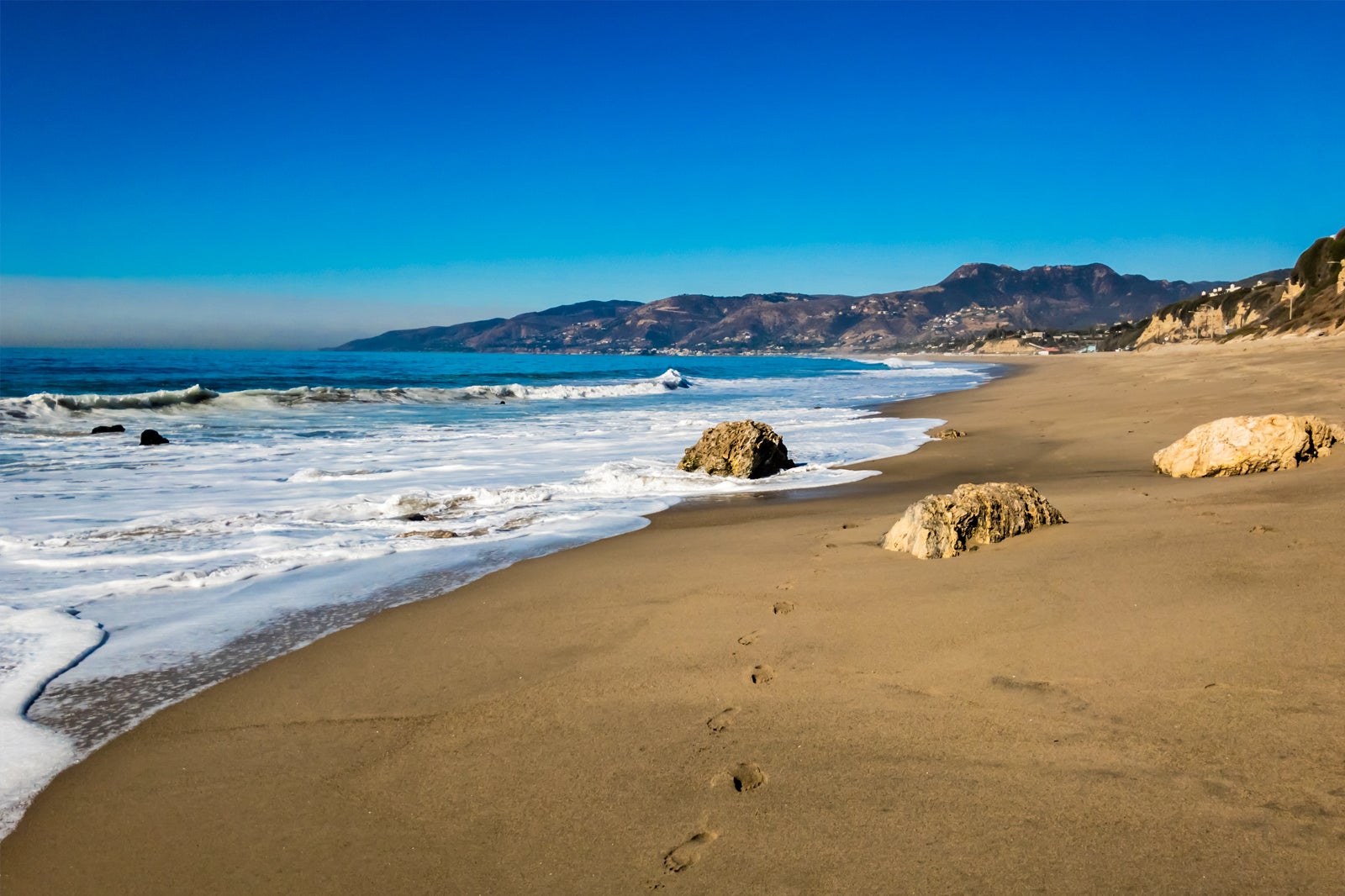 ZUMA BEACH, CALIFORNIA, USA - People on Zuma beach, public beach