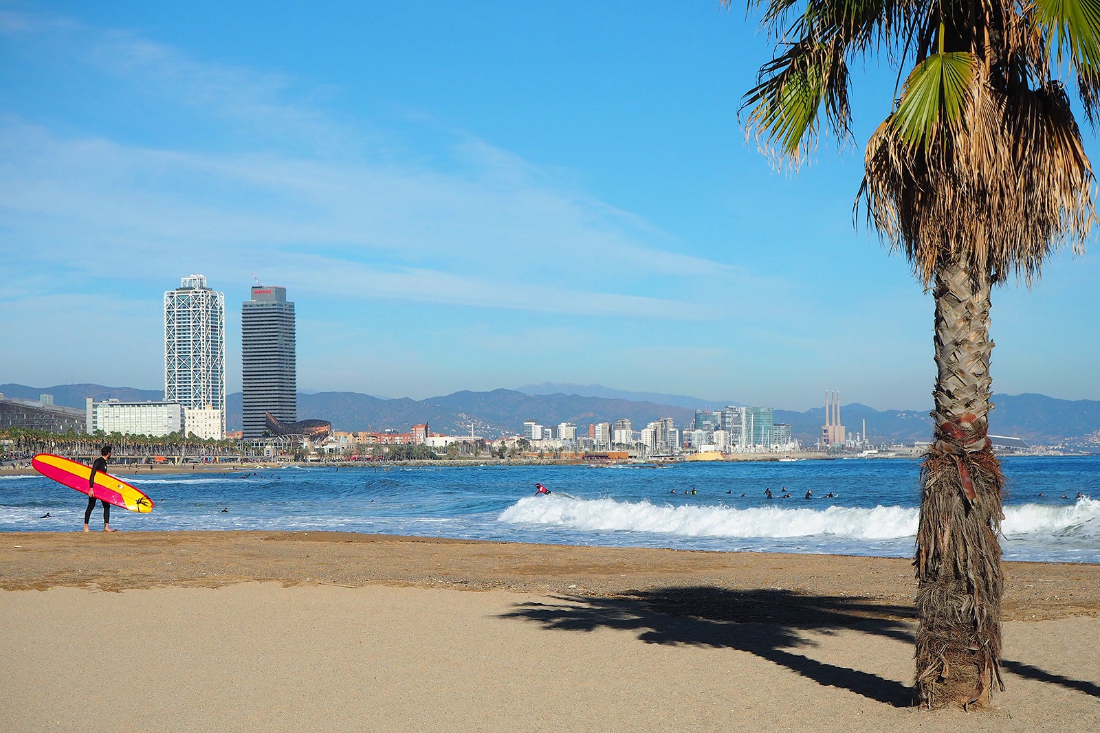 Sant Sebastià Beach in Barcelona - Kick Back and Relax or Play in the ...