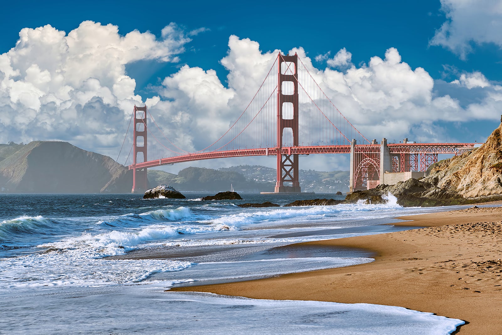 Baker Beach In San Francisco Relax At The Feet Of Serpentine Cliffs With Sun And Sand Go Guides